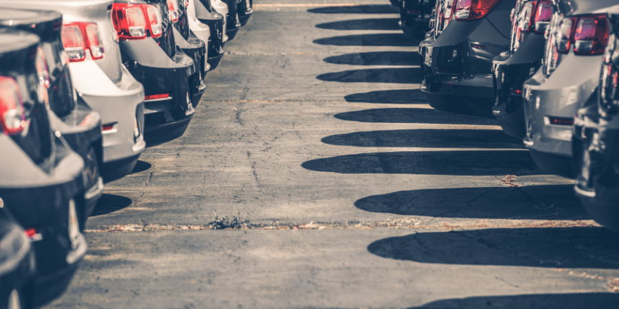 car yard row of cars