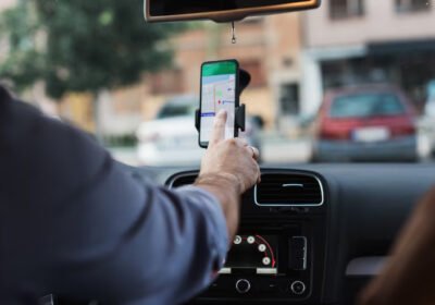 handsome-young-man-using-smart-phone-navigation-application_473712-26